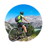 Person on bike looking at mountains