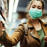 Shopper wearing facemask whilst shopping amid COVID pandemic