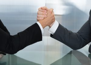 Image of handshake between two people signifying collaboration