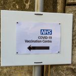 Image of a sign for COVID-19 vaccination centre